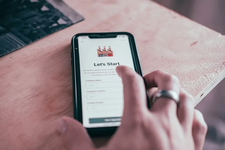 A person completing an online form on a smartphone.