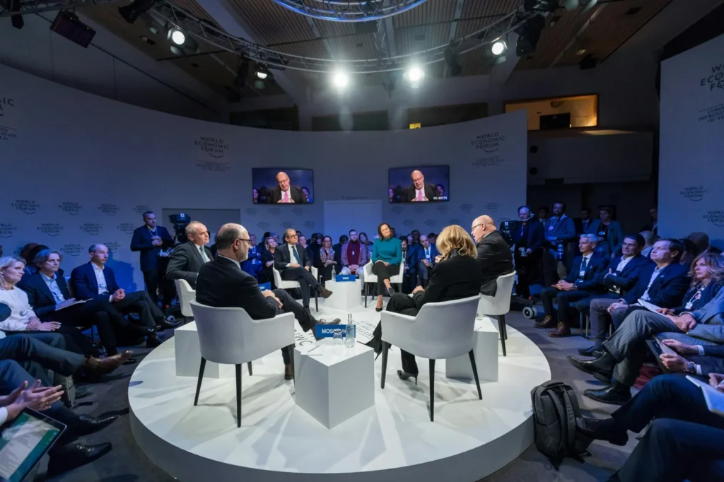 People taking part in a discussion at a conference