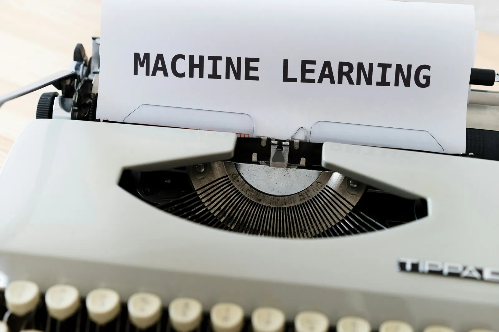 The words Machine Learning typed on paper in a typewriter