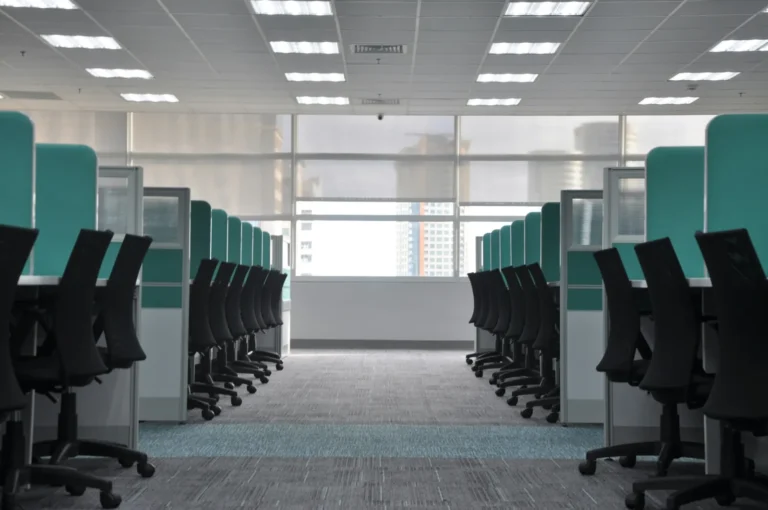 Empty open-plan office with desks and chairs
